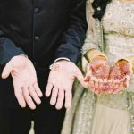 Young Muslim Couple making Du'a after their Nikah